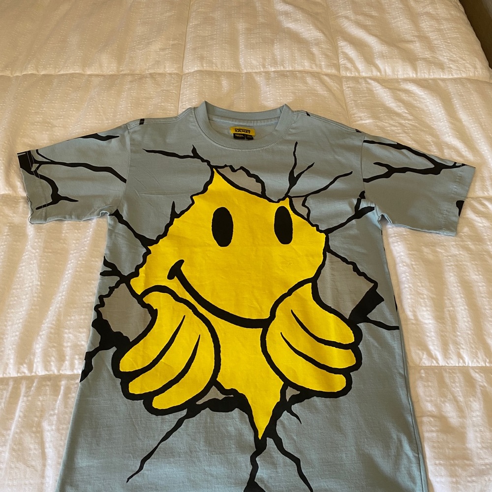 Chinatown Market Smiley original light blue size small t-shirt never worn.
